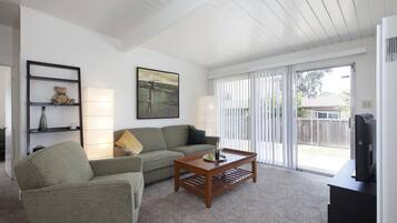 Exclusive Apartment, Non Smoking | Living room | Flat-screen TV