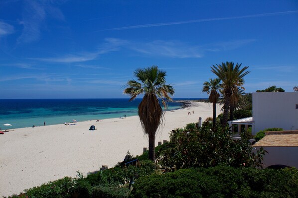 On the beach, sun loungers