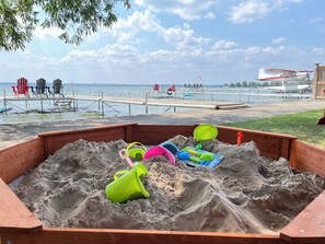 On the beach, sun loungers, beach towels