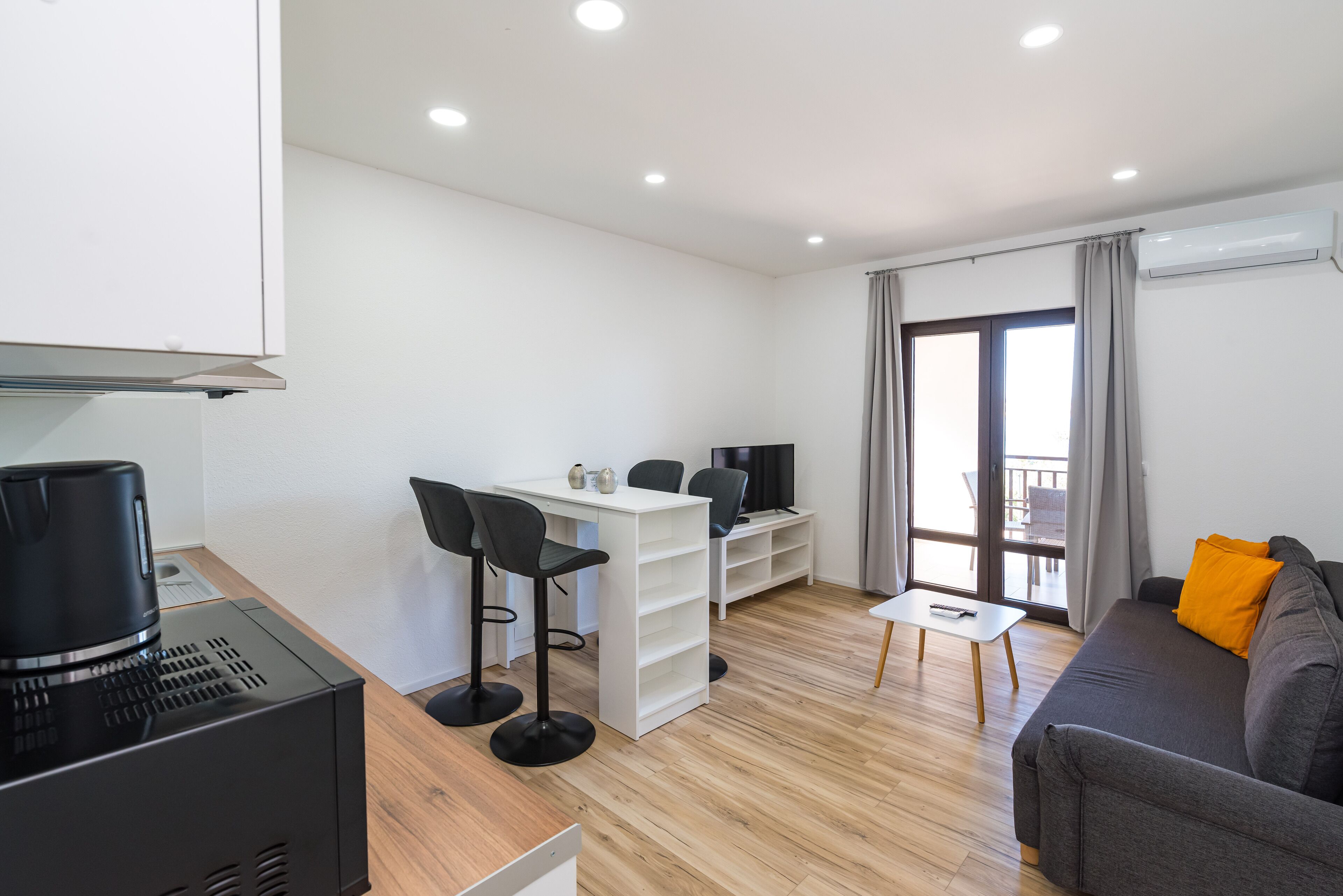 family apartment | living area | 82-cm lcd tv with satellite channels