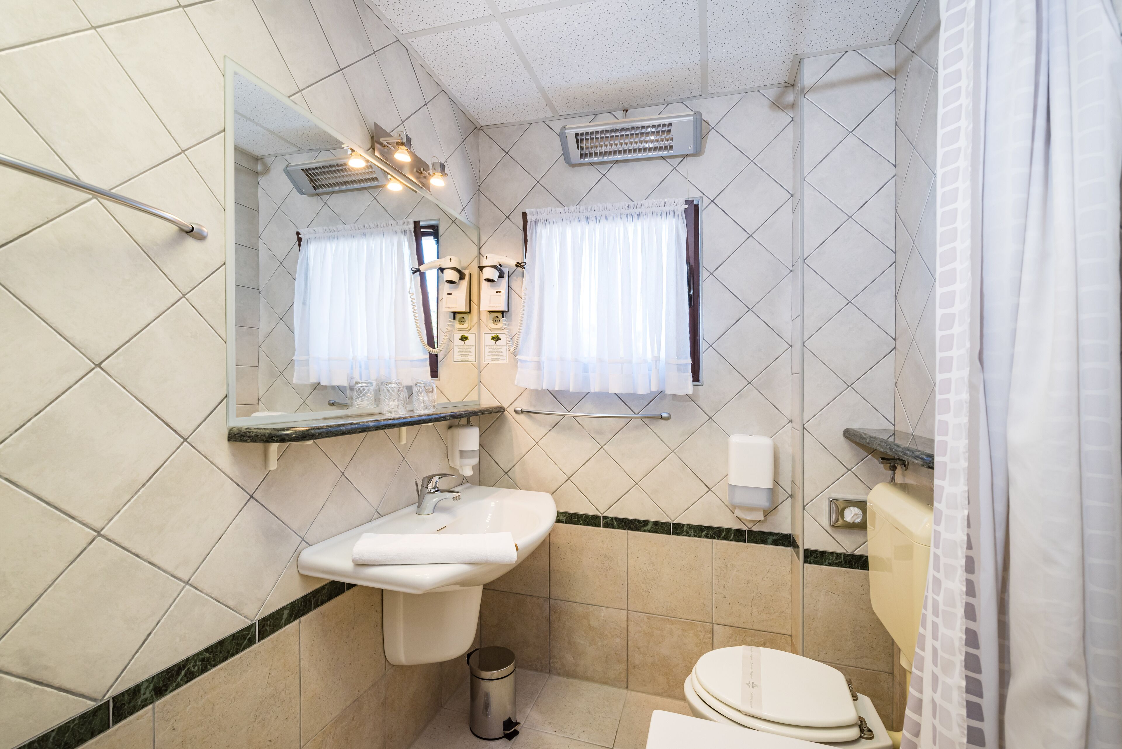 double or twin room | bathroom | shower, rainfall showerhead, free toiletries, hair dryer