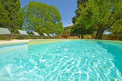 Former Ardèchoise farmhouse 12/14p 6 bdrms Private heated swimming pool not overlooked