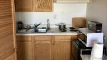 Apartment, Non Smoking | Private kitchen | Fridge, microwave, oven, stovetop