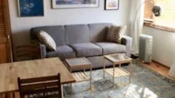 Apartment, Non Smoking | Living room | Flat-screen TV