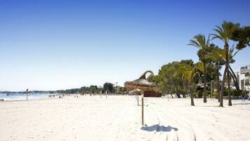 On the beach, beach towels