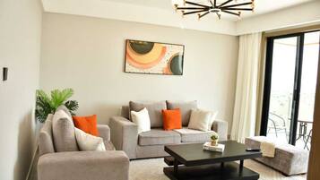Apartment, 2 Bedrooms, Balcony | Living area | 43-inch Smart TV with digital channels, Netflix, streaming services