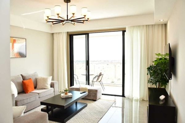 Apartment, 2 Bedrooms, Balcony | Living area | 43-inch Smart TV with digital channels, Netflix, streaming services