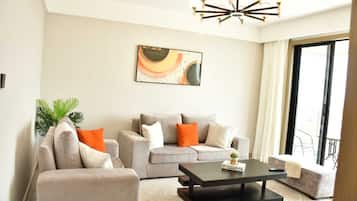 Apartment, 2 Bedrooms, Balcony | Living area | 43-inch Smart TV with digital channels, Netflix, streaming services