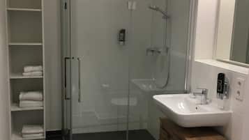 Shower, free toiletries, hair dryer, towels