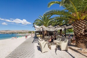 Beach nearby, sun loungers