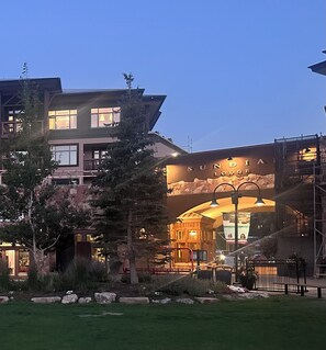 A lodge with a prominent entrance and a stone facade.