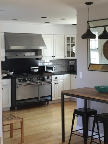 Newly renovated kitchen and breakfast bar.  