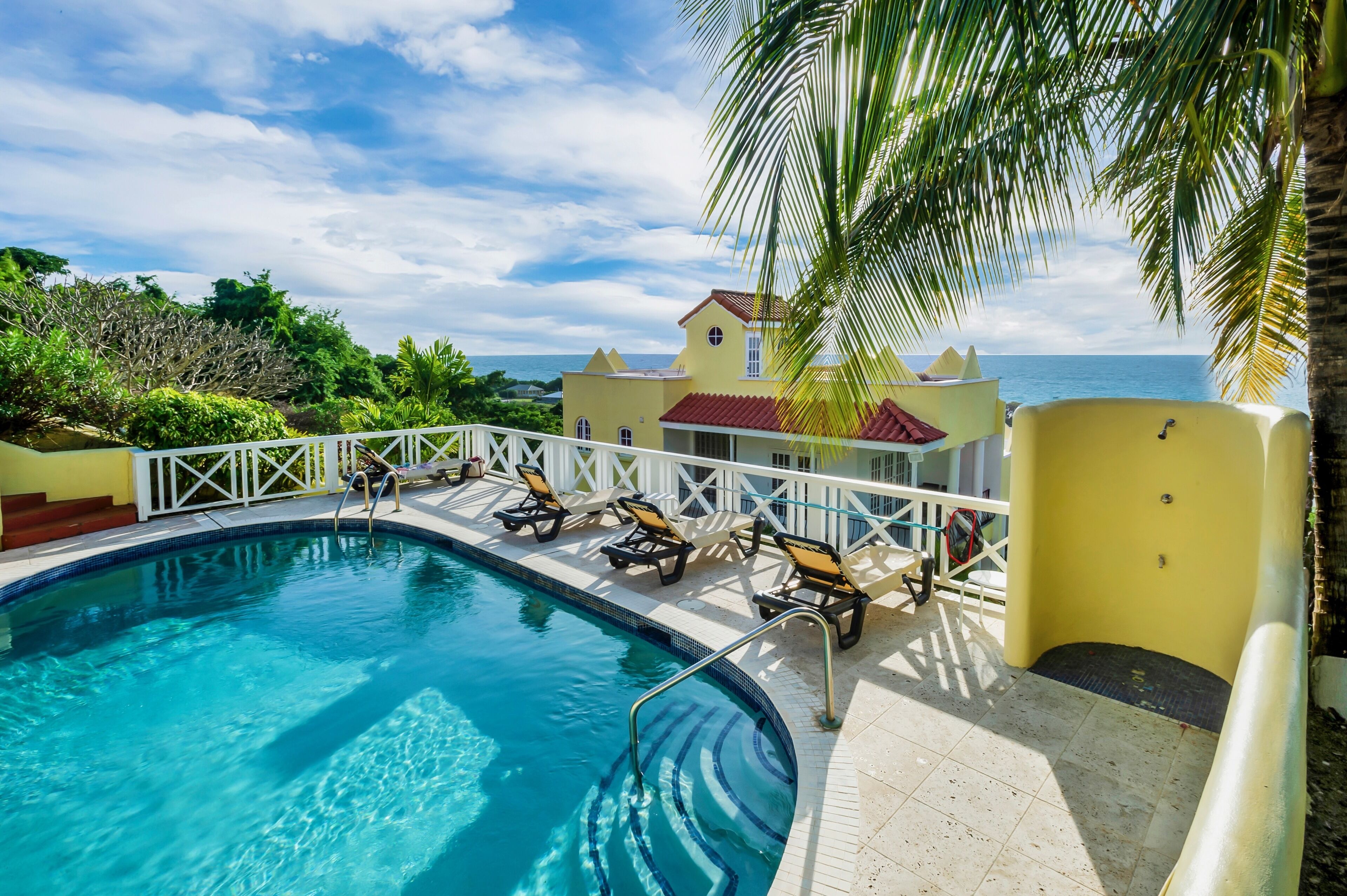 The pool with a view of the Caribbean Sea! Enjoy a dip as the sun sets!