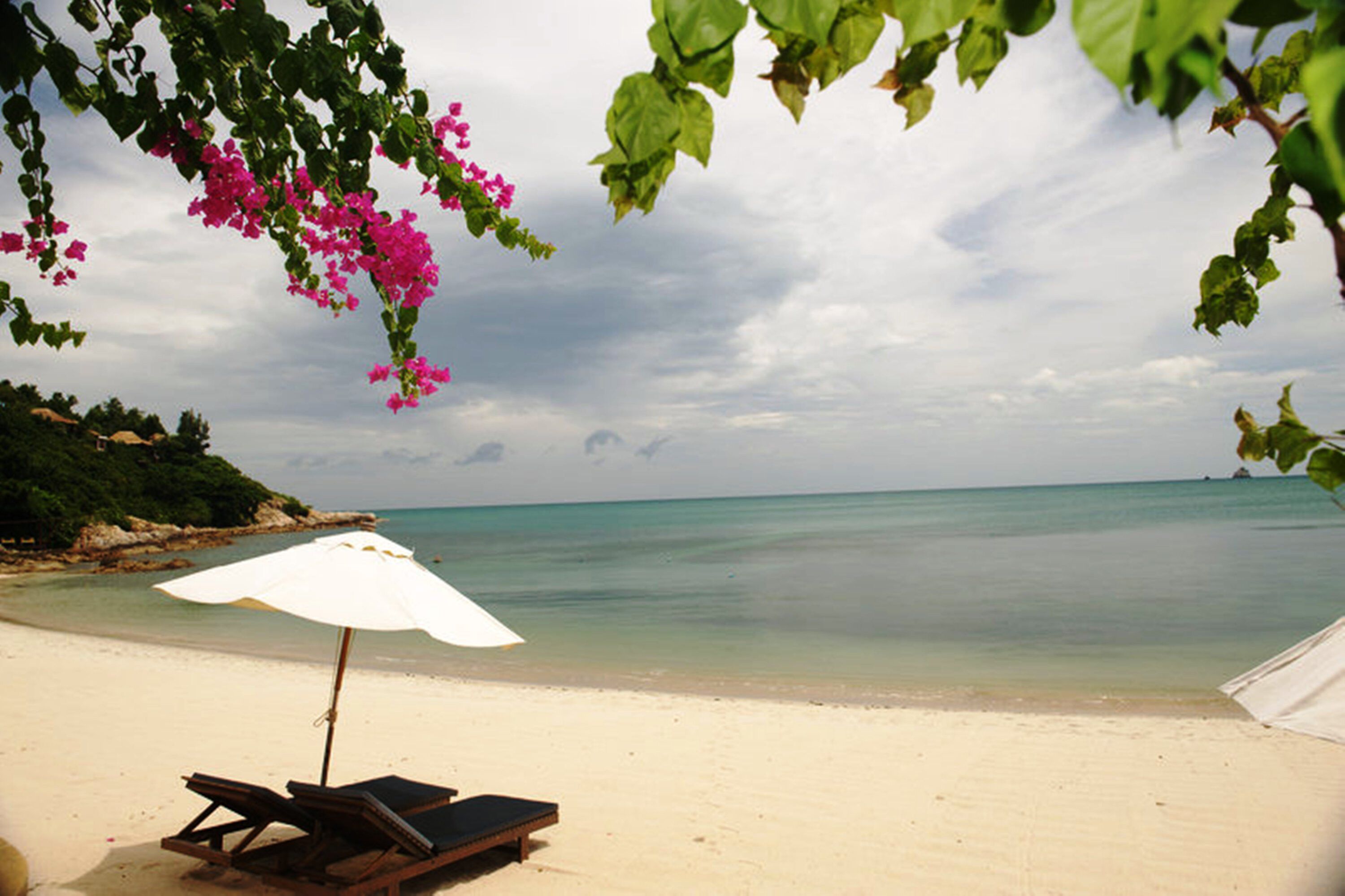 On the beach, sun loungers, beach towels