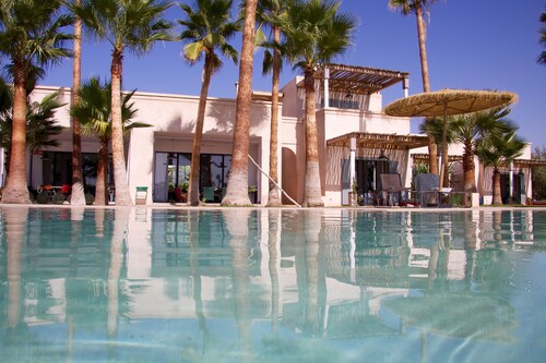 Exceptional residence surrounded by olive trees with breathtaking views of the Atlas