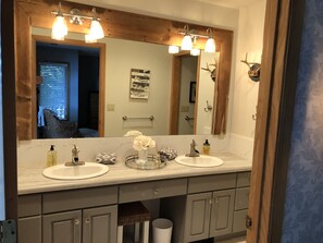 Combined shower/bathtub, hair dryer, towels, soap