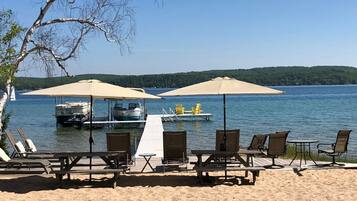 On the beach, sun-loungers
