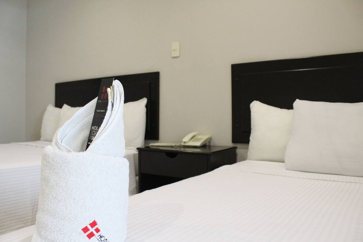 Classic Quadruple Room | Desk, laptop workspace, iron/ironing board (on request), WiFi (free)