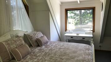 1 bedroom, desk, iron/ironing board, travel cot