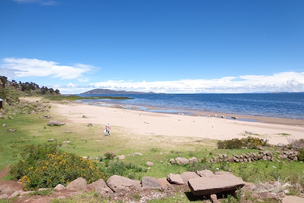 Beach nearby, white sand, beach volleyball
