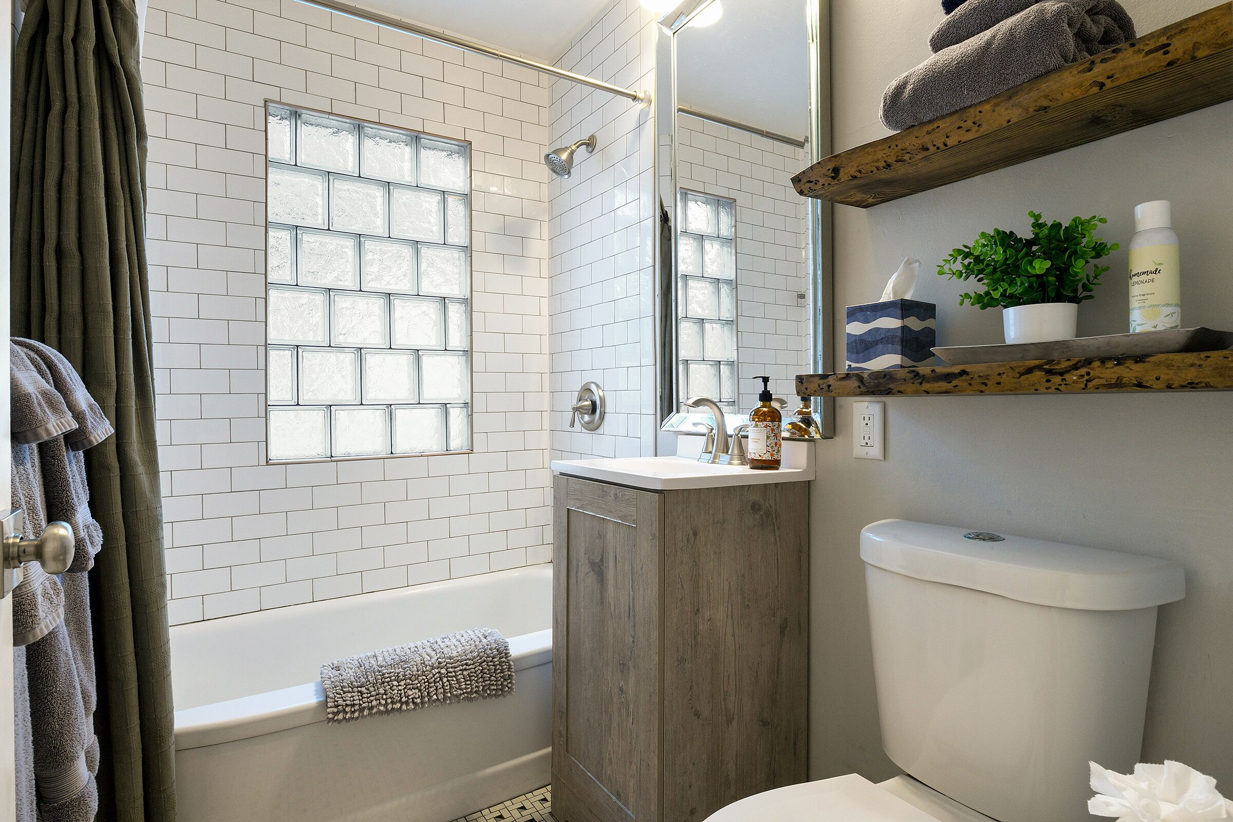 Combined shower/tub, hair dryer, towels, soap