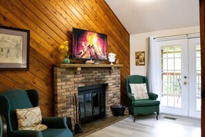Smart TV, fireplace, DVD player, foosball