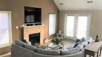 Smart TV, fireplace, DVD player, books