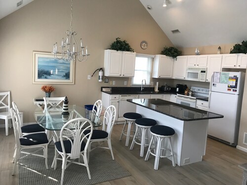 4 bedroom/2 bath updated top floor with 3 DECKS just 7 houses from the beach!