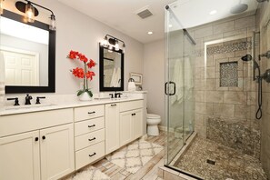 Combined shower/tub, hair dryer, towels, toilet paper