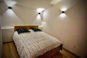 2 bedrooms, soundproofing, iron/ironing board, travel cot