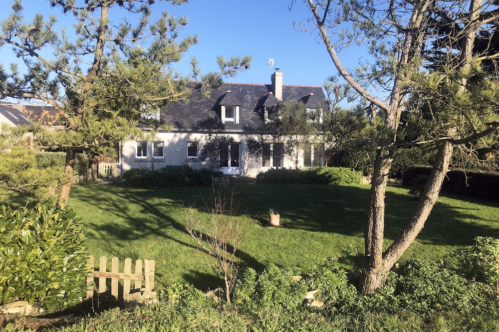 Large house surrounded by nature close to the ocean