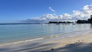 Una spiaggia nelle vicinanze, teli da spiaggia