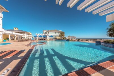 Nirvana! Beach Front Luxury Condo Across from Beach Resort. Bay and Ocean Views.