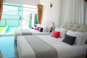Deluxe Villa, Multiple Beds, Non Smoking, Pool View | 4 bedrooms, premium bedding, free WiFi