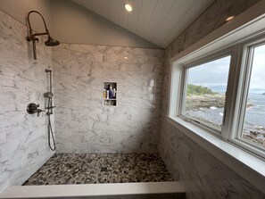 Bathtub, hair dryer, towels, soap