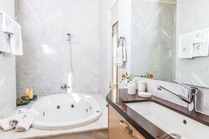 A modern bathroom with a bathtub, a sink, and a shower. - Villa Mariposa- Panoramic Sea View - Near Chania City - Private Pool - Spacious  (chania)