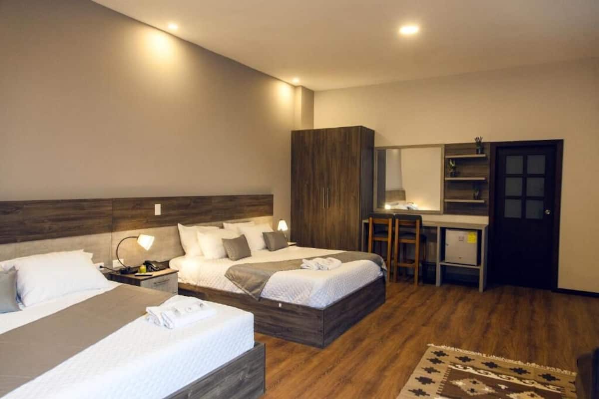 Junior Suite, Garden View | 1 bedroom, down comforters, Select Comfort beds, in-room safe
