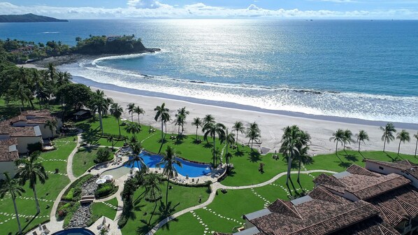 On the beach, sun loungers, beach towels