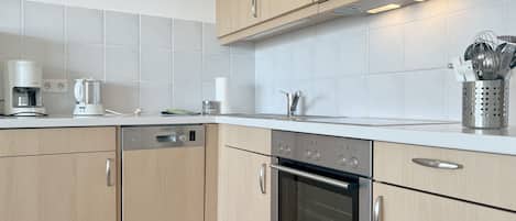 Fridge, oven, dishwasher, highchair