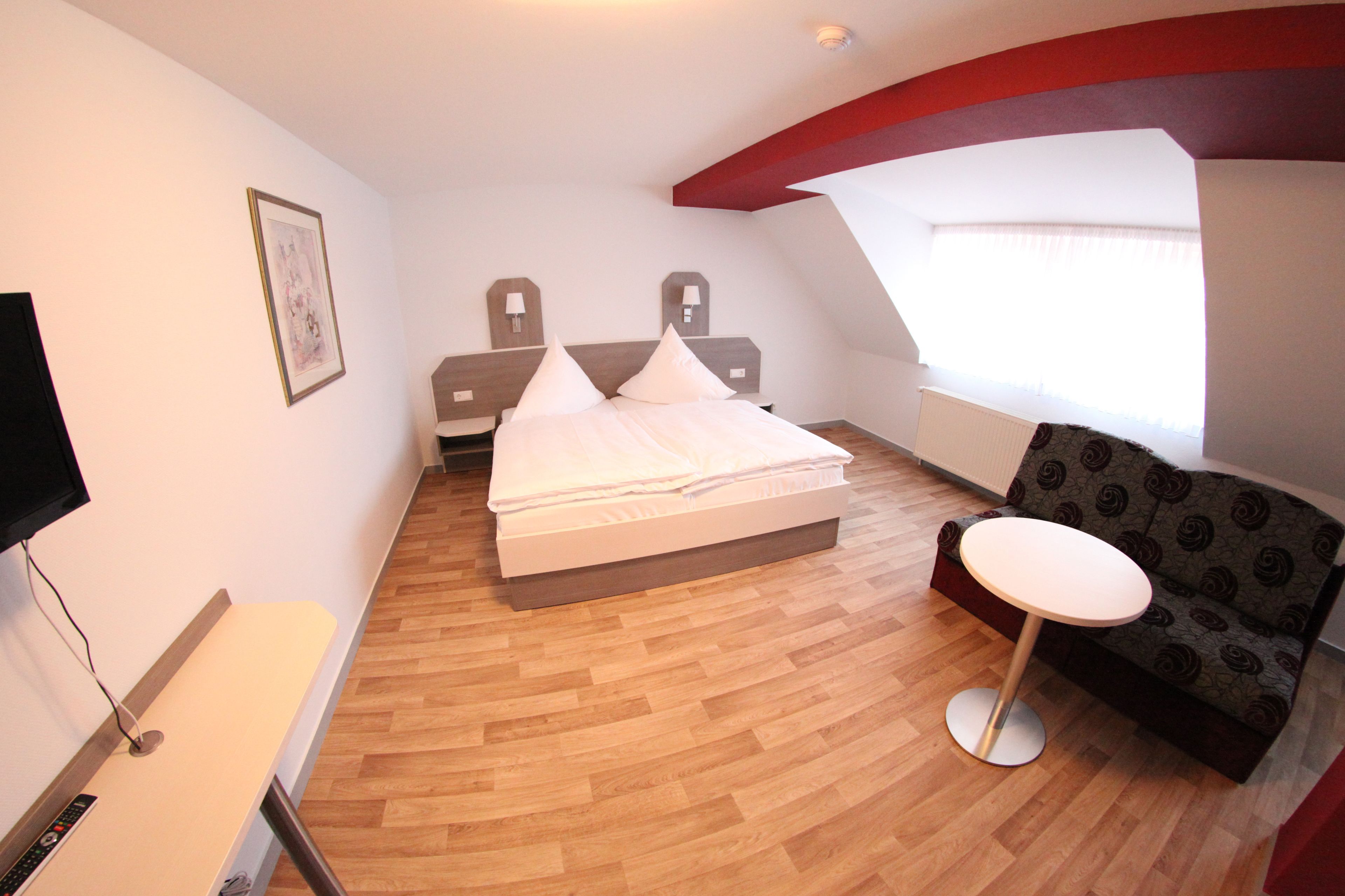 basic double room | desk, laptop workspace, blackout curtains, cots/infant beds