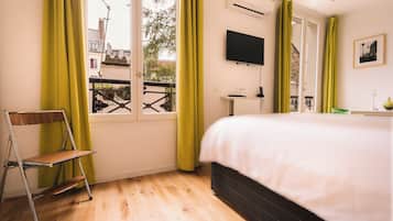 1 chambre, fer et planche à repasser, Wi-Fi gratuit, draps fournis