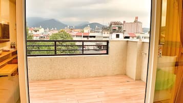 Deluxe Quadruple Room | Balcony