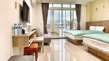 Deluxe Quadruple Room | Hypo-allergenic bedding, blackout drapes, soundproofing, free WiFi