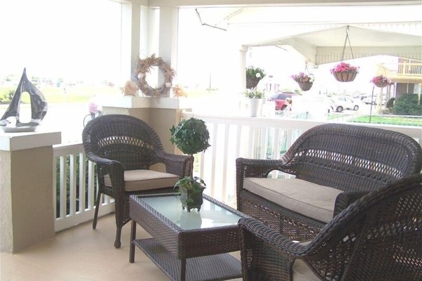 Grab a seat & a cold drink. Enjoy the cool breezes, sunsets, & fireworks