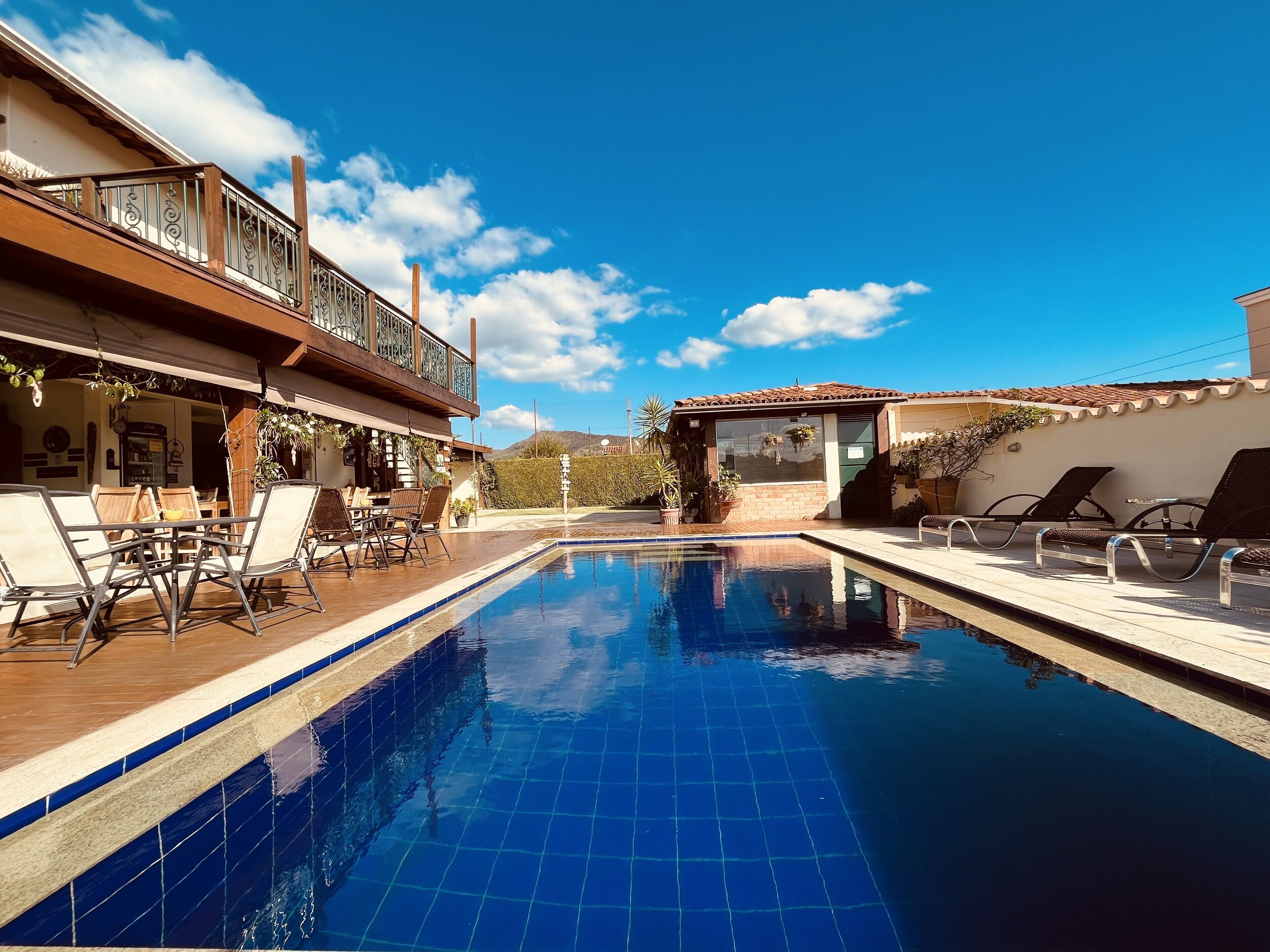 Outdoor pool, pool umbrellas, sun loungers