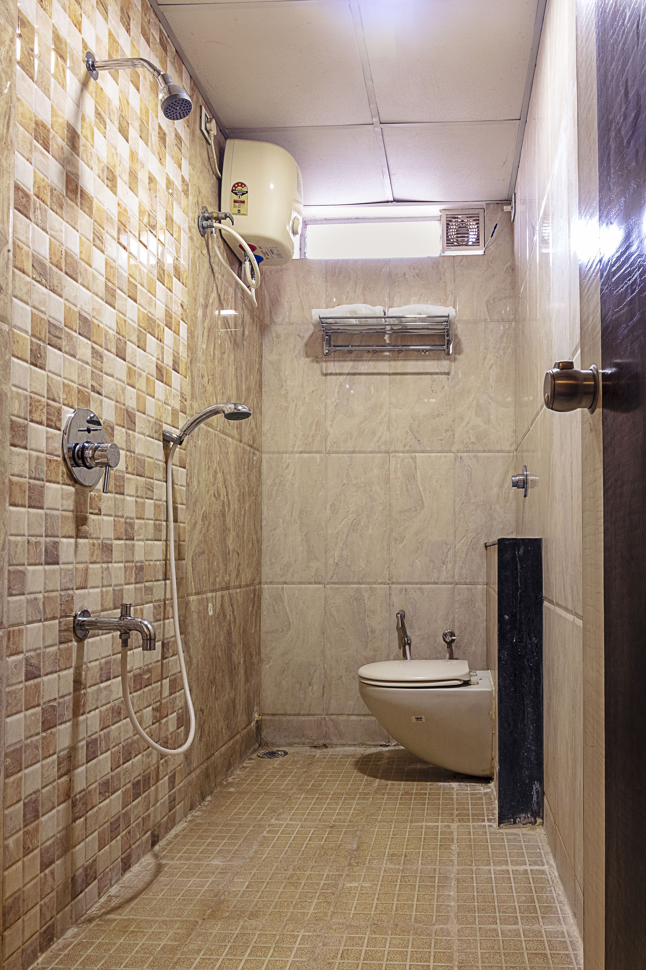 shower, rainfall showerhead, slippers, towels