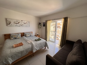 Chambre Triple Familiale, balcon, vue ville