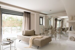 Magnolia - Ground Floor Condo with Private Pool and Garden | Living area | Smart TV, fireplace, Netflix