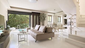 Magnolia - Ground Floor Condo with Private Pool and Garden | Coin séjour | TV connectée, cheminée, Netflix