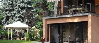 Elegant villa surrounded by a large garden available to guests